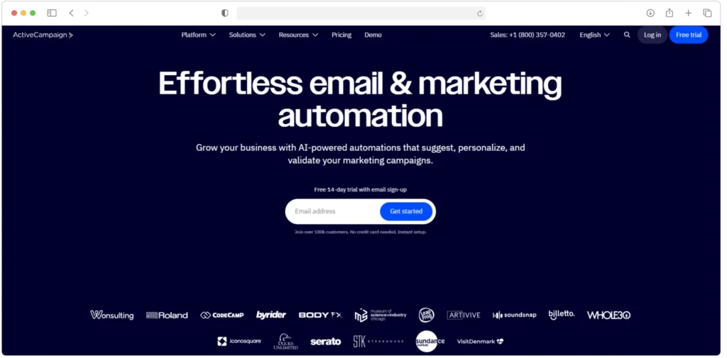 Screenshot of ActiveCampaigns homepage featuring the text Effortless email & marketing automation with a call-to-action for email entry. The page background is dark blue, and various brand logos are displayed at the bottom.